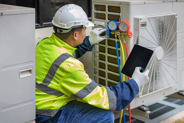 Professional Heat Pump Repair technician working in Robinson, IL